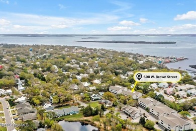 This desirable end-unit condominium offers a light-filled layout