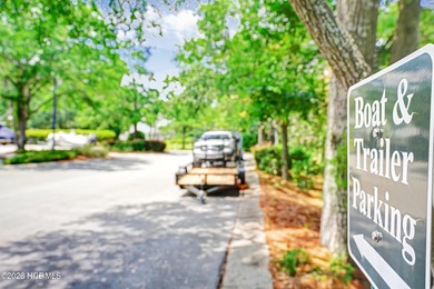 This desirable end-unit condominium offers a light-filled layout