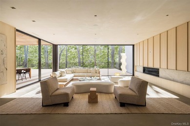 An architecturally significant modern retreat set on two private - photo 2