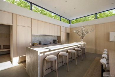 An architecturally significant modern retreat set on two private - photo 7