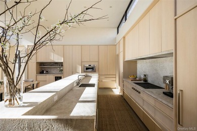 An architecturally significant modern retreat set on two private - photo 8