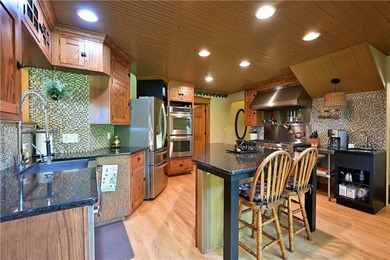 1 beautiful home + 3 cabins!! This one-of-a-kind property - photo 13