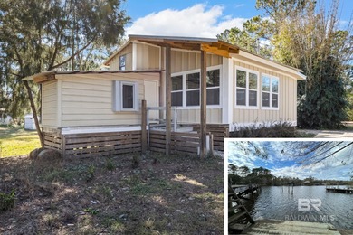 (private lake, pond, coastal) Home For Sale in Summerdale Alabama