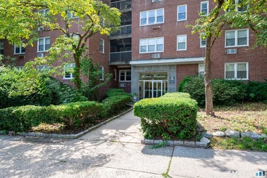 Welcome home to this charming co-op offering the perfect blend - photo 1
