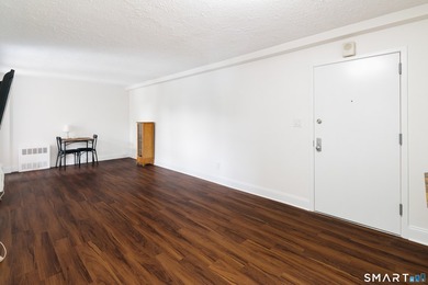 Welcome home to this charming co-op offering the perfect blend - photo 2