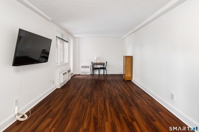 Welcome home to this charming co-op offering the perfect blend - photo 4
