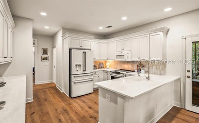 Nestled on a private circle within the prestigious Callawassie - photo 19