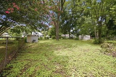 Large fenced in backyard, perfect for entertaining. Discover the - photo 24