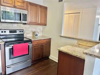 Enjoy coastal living at its best in this bright and inviting - photo 12