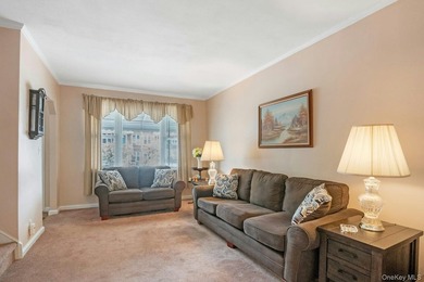 This well-maintained brick home offers a spacious and functional - photo 4