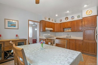 This well-maintained brick home offers a spacious and functional - photo 6