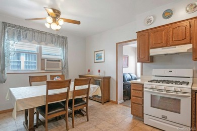This well-maintained brick home offers a spacious and functional - photo 7