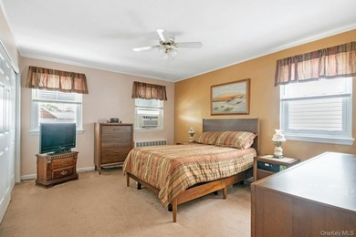 This well-maintained brick home offers a spacious and functional - photo 10