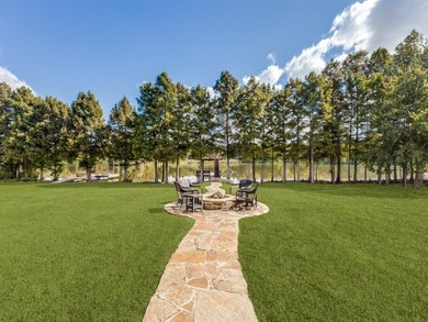 Nestled in the highly sought-after Waters Edge community - photo 22