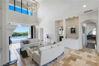 Unobstructed tropical waterfront views define this fully - photo 11
