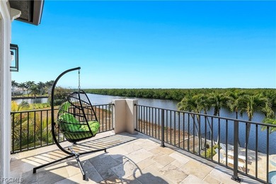 Unobstructed tropical waterfront views define this fully - photo 32