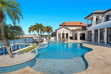 Unobstructed tropical waterfront views define this fully - photo 40