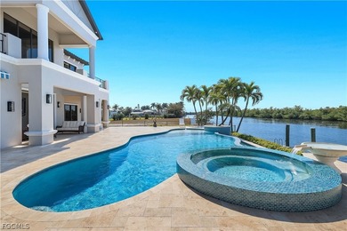 Unobstructed tropical waterfront views define this fully - photo 43