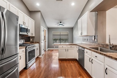 Welcome to this beautifully maintained 4 bedroom, 2 bathroom - photo 3