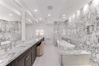 A stunning two-story penthouse residence commanding over 6,600