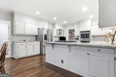 WELCOME HOME to this 4 bed, 3.5 bath golf-side brick-front - photo 14