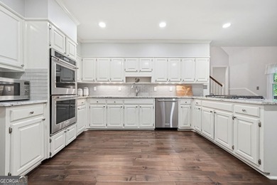 WELCOME HOME to this 4 bed, 3.5 bath golf-side brick-front - photo 15