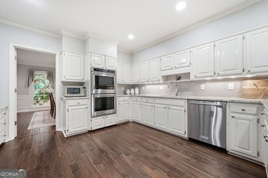 WELCOME HOME to this 4 bed, 3.5 bath golf-side brick-front - photo 17