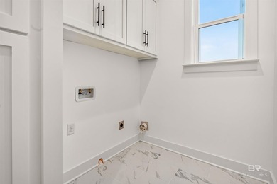 Now complete and move-in ready! This Gold Fortified waterfront - photo 31