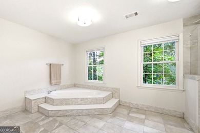 WELCOME HOME to this 4 bed, 3.5 bath golf-side brick-front - photo 37