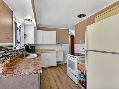 Welcome to 319 Windsor Rd in Greece! This charming Cape Cod - photo 8