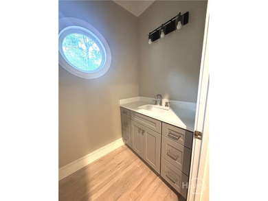 Stunningly renovated golf course home in the highly sought-after - photo 11