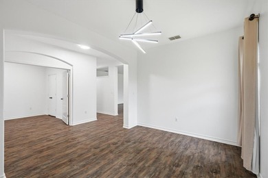 NEWLY renovated four-bedroom,two-bathroom split-plan home with - photo 12