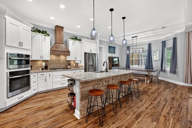 Custom-built and only 4 years young, this exceptional 5-bedroom - photo 16