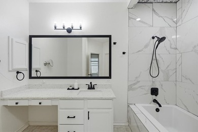 NEWLY renovated four-bedroom,two-bathroom split-plan home with - photo 21