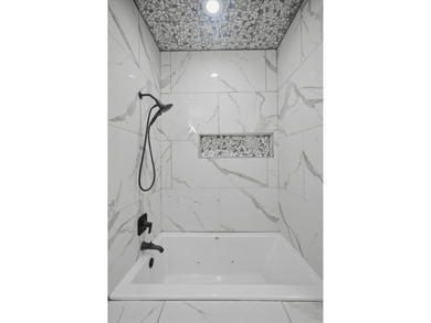 NEWLY renovated four-bedroom,two-bathroom split-plan home with - photo 25
