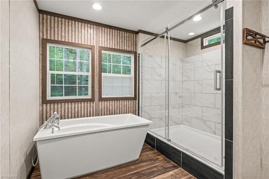 Welcome to 194 Lakefield Road in Stokesdale! Built in 2022, this - photo 22