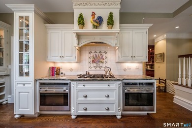 Set on 5.65 secluded acres in the heart of Madison, this - photo 11