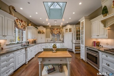 Set on 5.65 secluded acres in the heart of Madison, this - photo 12