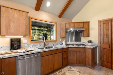 Sweeping lake views take center stage from all three levels of - photo 15
