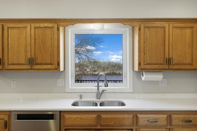 Discover the serenity and recreation of riverfront living in a - photo 15