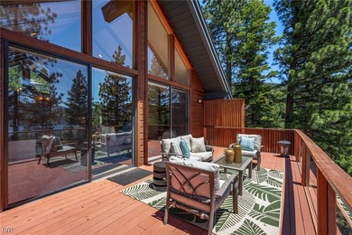 Sweeping lake views take center stage from all three levels of - photo 20