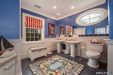 Set on 5.65 secluded acres in the heart of Madison, this - photo 31