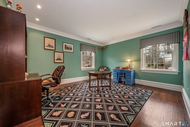 Set on 5.65 secluded acres in the heart of Madison, this - photo 32