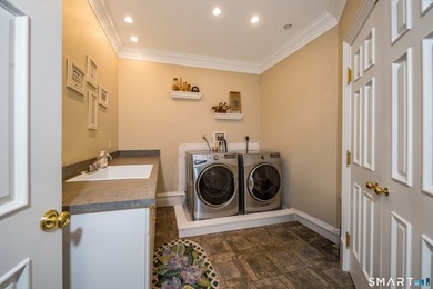 Set on 5.65 secluded acres in the heart of Madison, this - photo 34