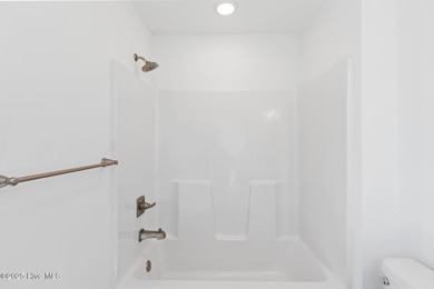 Brand new and move-in ready in Anchors Bend Townes. This