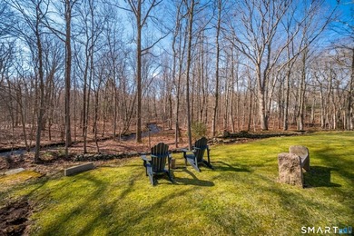Set on 5.65 secluded acres in the heart of Madison, this - photo 37