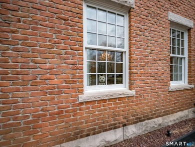 Set on 5.65 secluded acres in the heart of Madison, this - photo 39