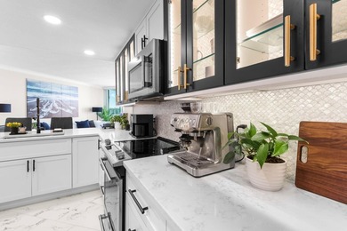 Welcome to an exceptional waterfront retreat in the highly - photo 11