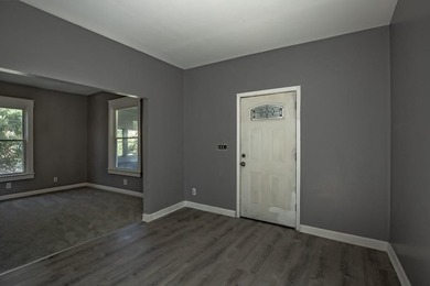 Adorable home with covered front porch. Large entry foyer for - photo 11