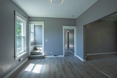 Adorable home with covered front porch. Large entry foyer for - photo 12